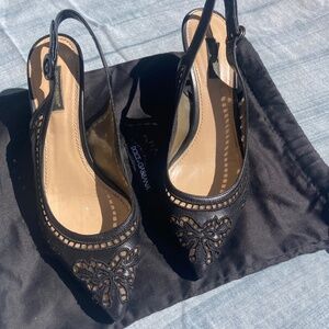 Black eyelet sling-back kitten heels